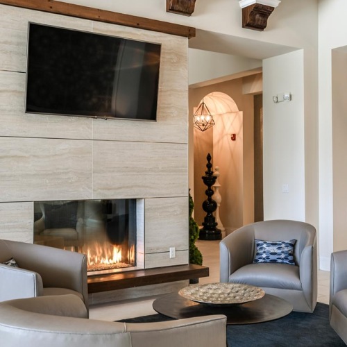 Find your perfect fit at Venetian Isle a living room with a fireplace