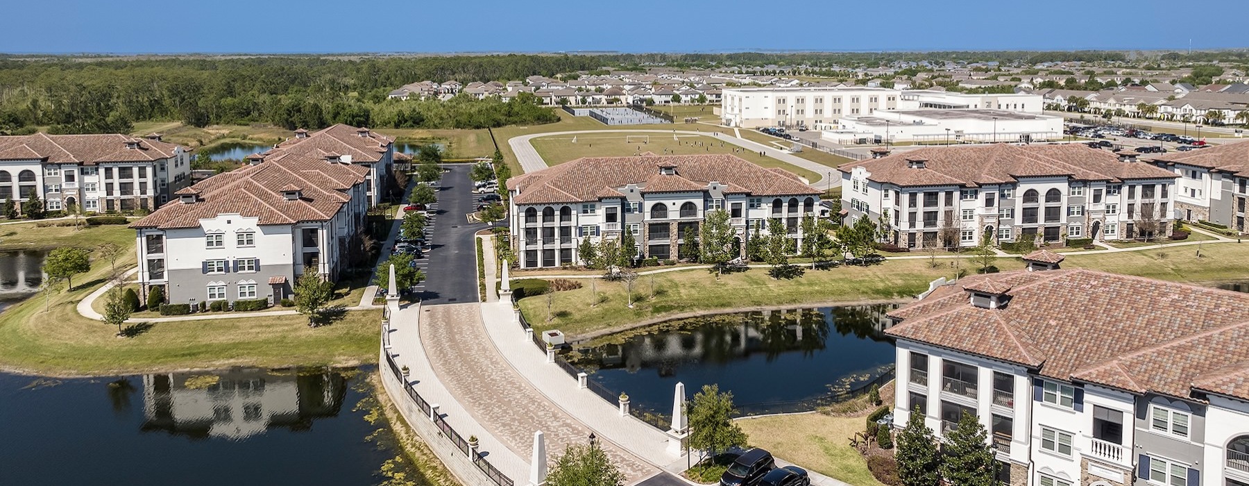 a body of water with buildings around it